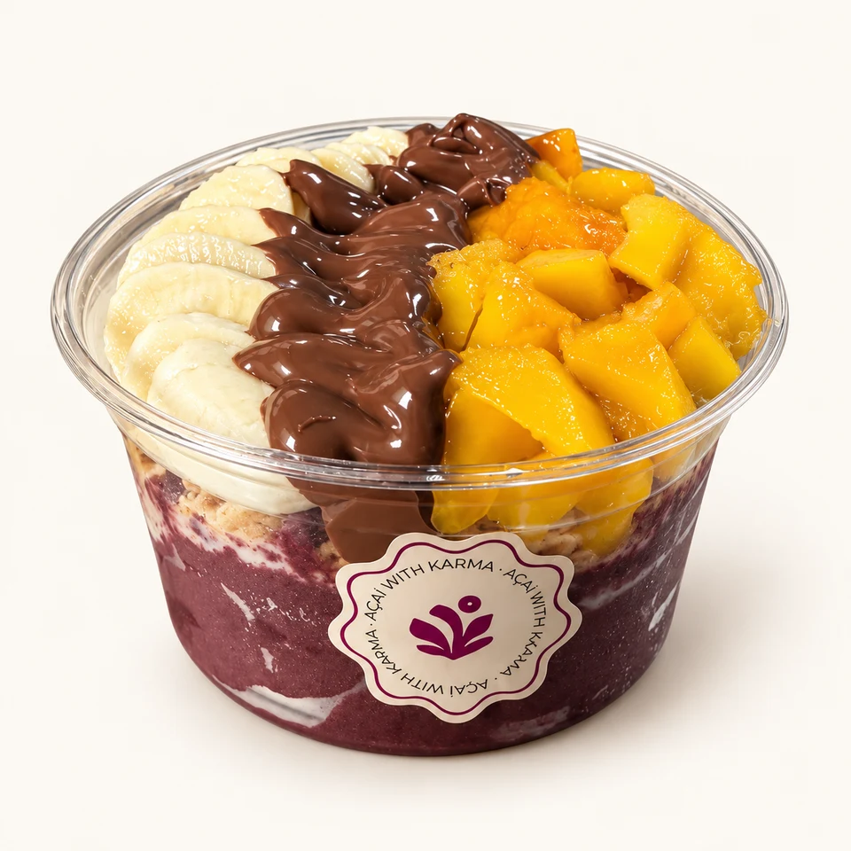 Açaí Caprichoso con Granola con chocolate, Leche condensada, Plátano, Mango, Chocolate con avellana